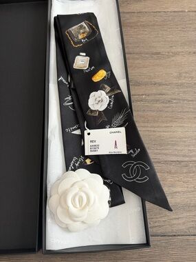 CHANEL Black Silk Slim Bandeau with White Camellia and Gold Accents